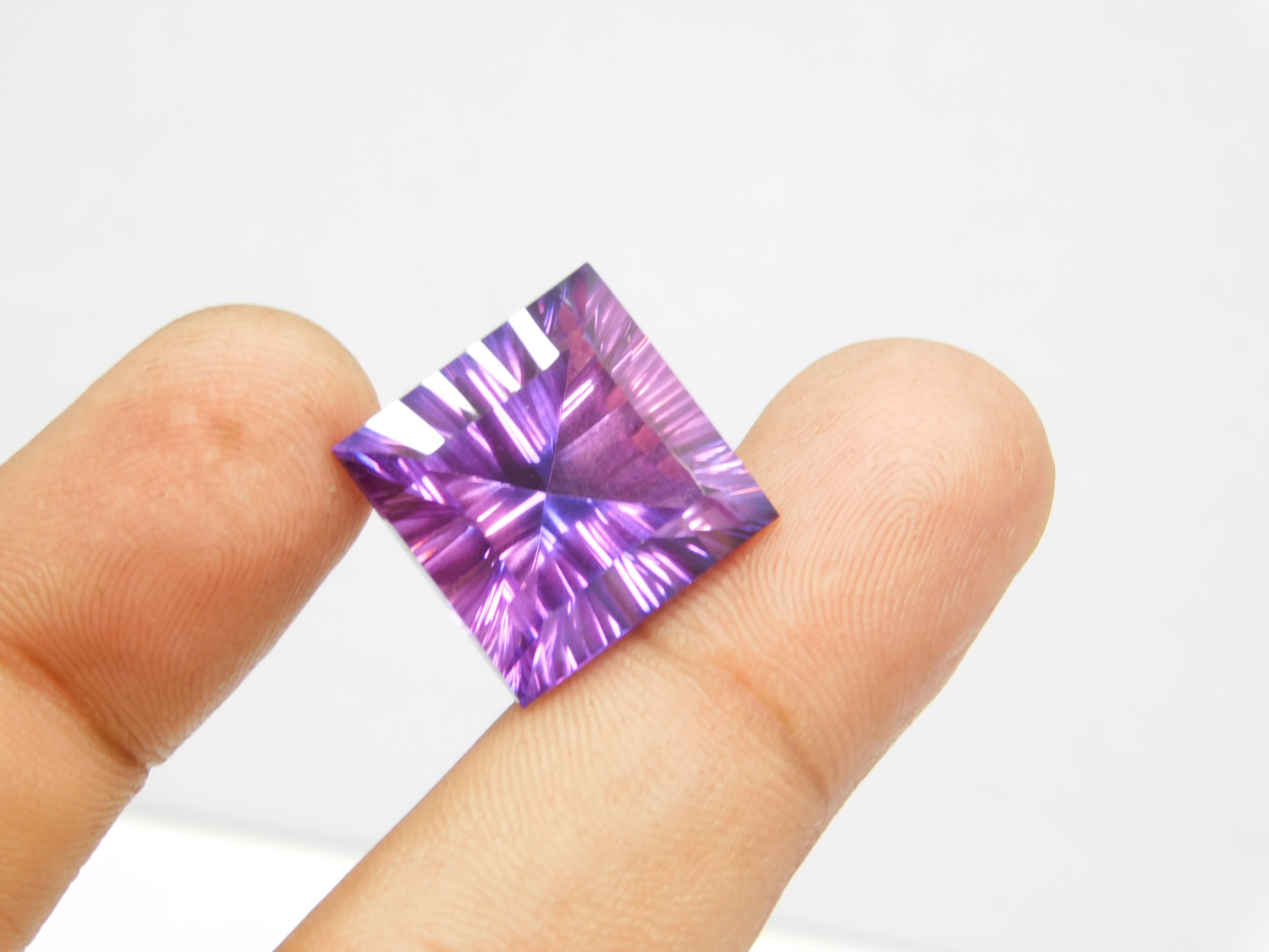 25.60 Carats! Natural Purple Amethyst Faceted. Concave Cut